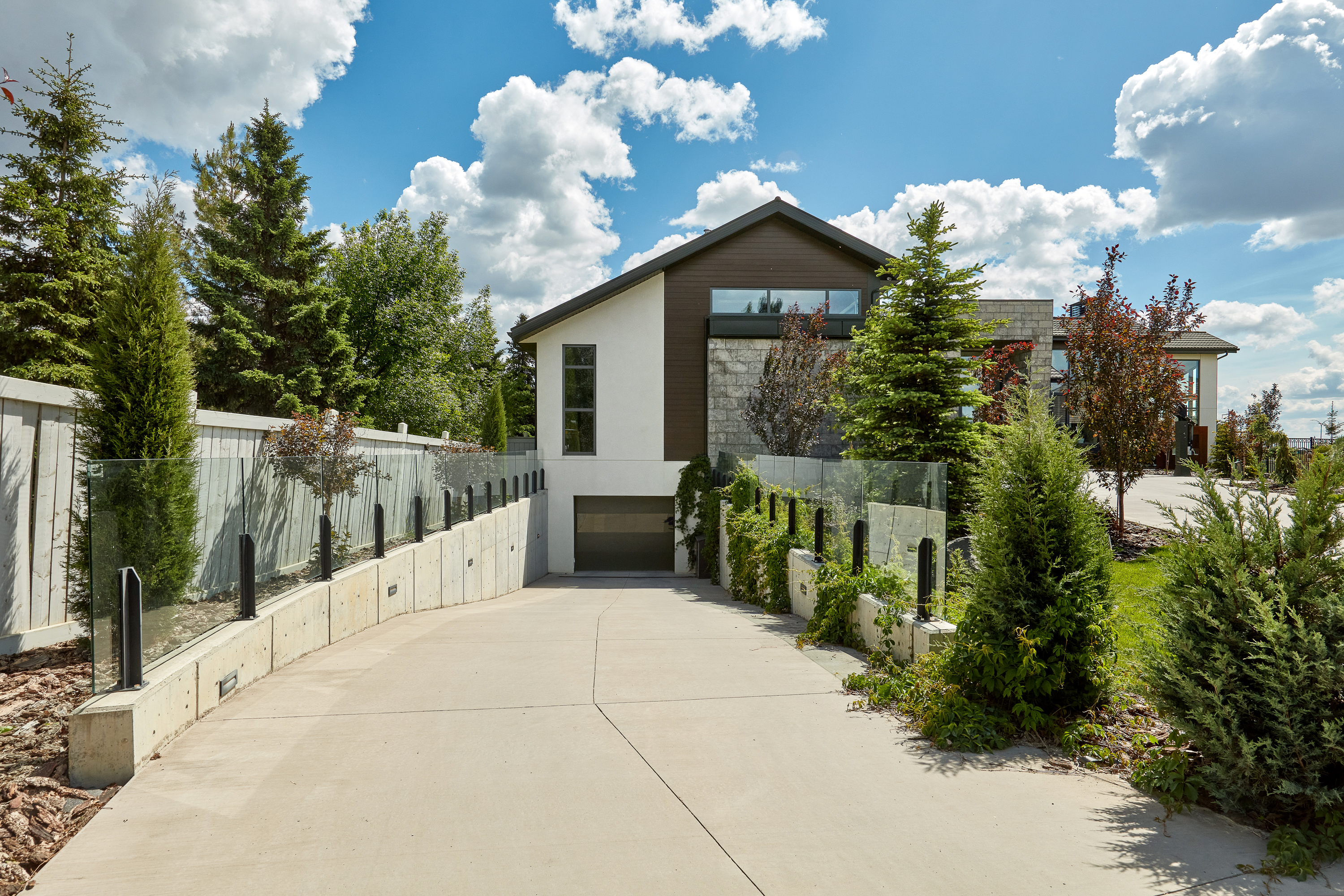Driveway of 46 Kingsford Crescent home for sale in St. Albert by Holland & Associates Real Estate.